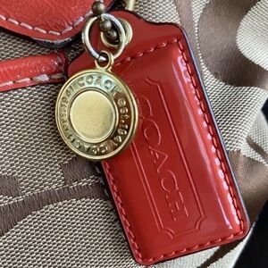 Beautiful, Auth Coach Signat Tote or shoulder bag in a really soft,coral color.